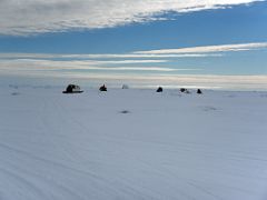 01A Ski-Doos Lead Qamutiik Sleds To Look For Polar Bears At The Beginning Of Day 4 On Floe Edge Adventure Nunavut Canada
